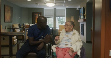 WesleyLife team member and resident chatting