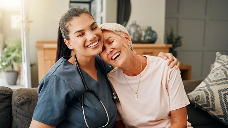 hug or medical caregiver in house living room in comfort trust