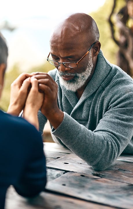 Senior man praying