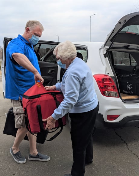 volunteers making a delivery