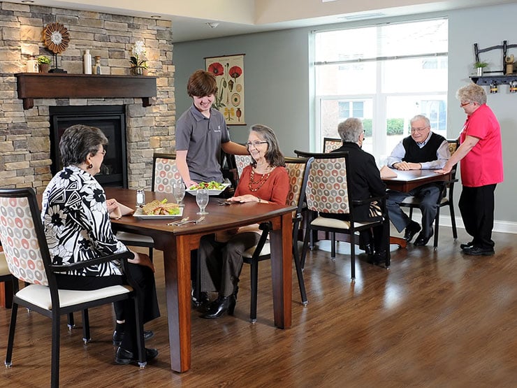 Senior friends at the dining room table