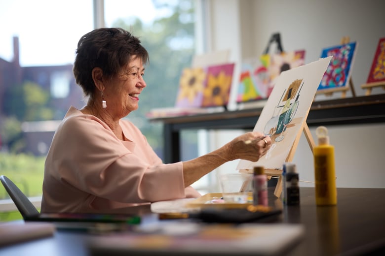 Woman painting in her spare time