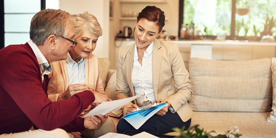 Senior couple getting advice from their financial consultant